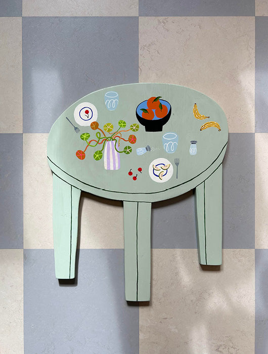 En tavla som föreställer ett bord design av Josefin Norlin